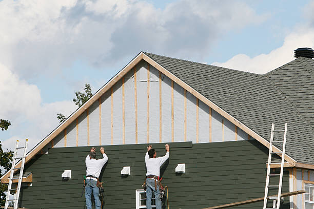 Professional Storm Damage Siding Repair technician working in Franklinville, NC